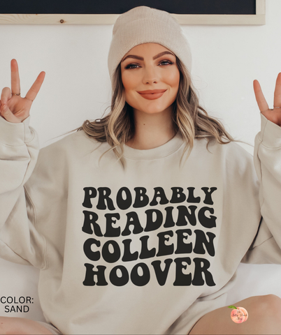 Probably reading Colleen Hoover sweatshirt